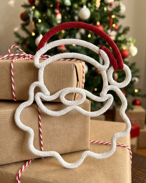 Babbo Natale in cordino sui pacchetti
